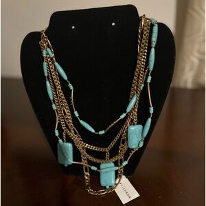 Silpada KR “Toes in the sand”. Turquoise and brass necklace
